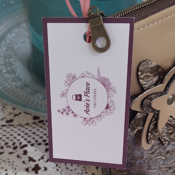 Hand Crafted Tan and Brown Cosmetic Bag with Floral Accent - Picture 2 of 5